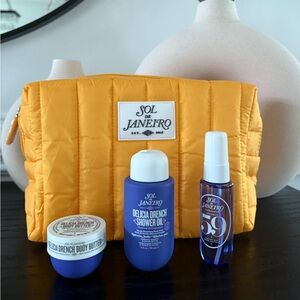 Sol de Janeiro 59 Fragrance Mist , body wash and body cream with Yellow Bag .
